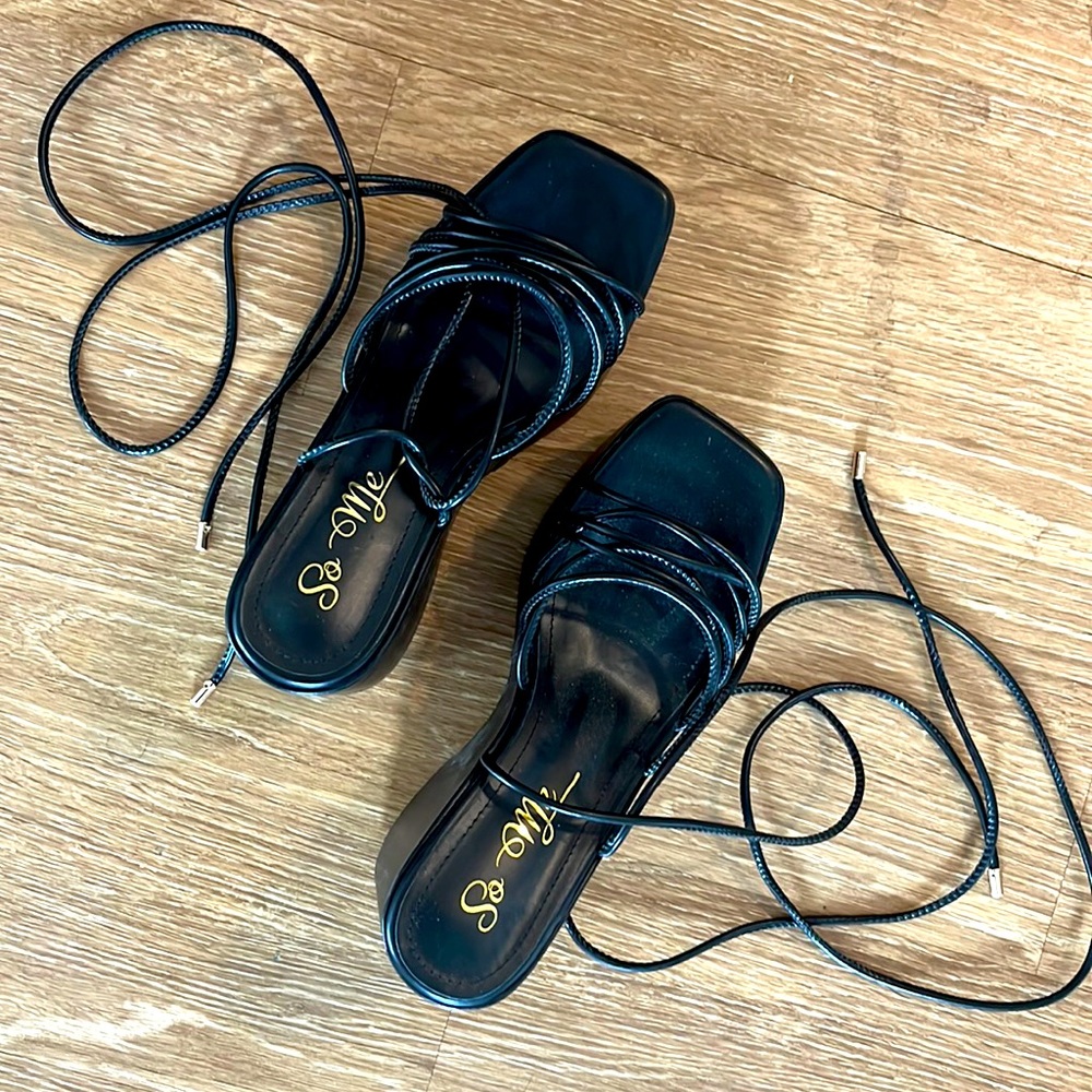 Lace up calve black wedges.